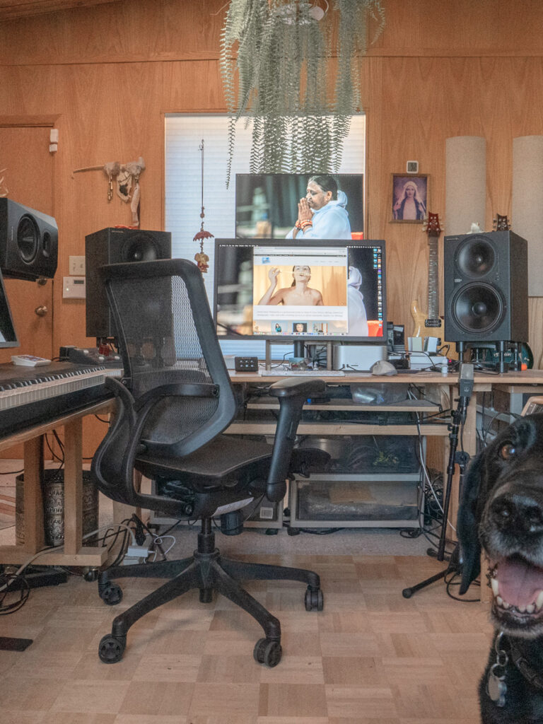 Desert Heart Studio control room with keyboards, mixing gear, and Mojo the dog