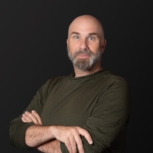 Theatrical actor headshot in Santa Fe studio showing dramatic expression.